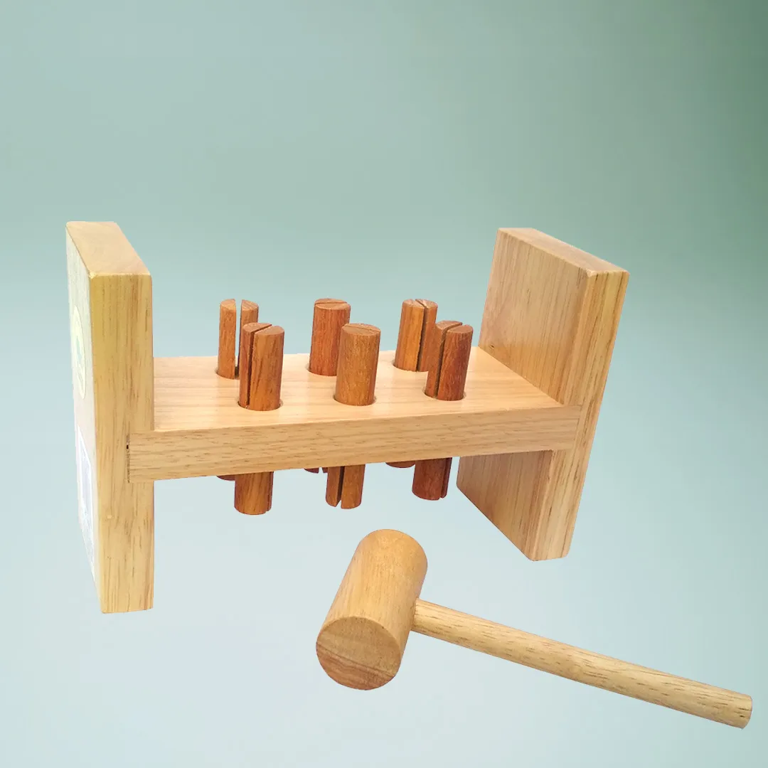 A wooden toy with sticks and a hammer, promoting fine motor skills and hand-eye coordination.